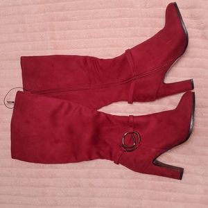 Red suede boots.